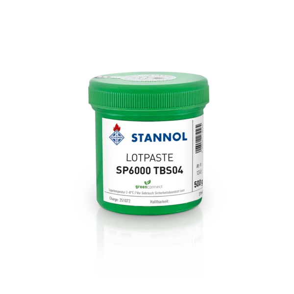 The image shows a green solder paste tin from Stannol. It has a white label with the Stannol logo and further product specifications.