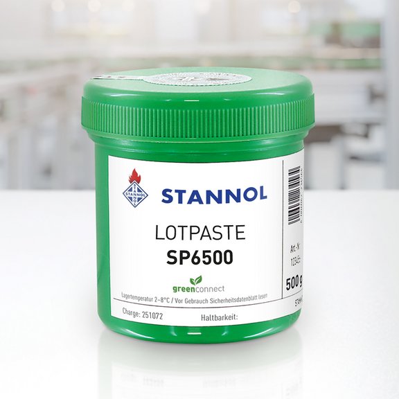 Grüner Behälter mit Stannol Lotpaste SP6500, 500g.