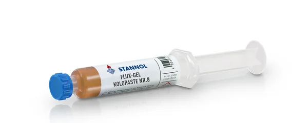 The picture shows Stannol's Flux-Gel Kolopaste No. 8 - a white syringe with a white label and blue cap.