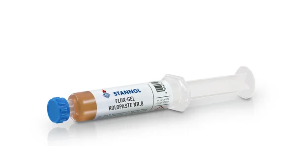 Auf dem Bild ist das Flux-Gel Kolopaste Nr. 8 von Stannol zu sehen - eine weiße Spritze mit weißem Etikett und blauer Kappe.