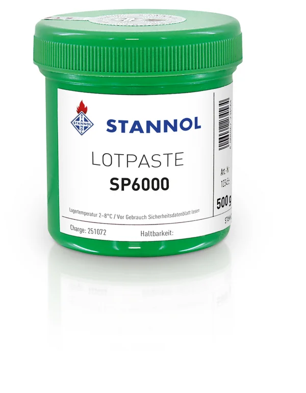 Auf dem Bild ist die Lotpaste SP6000 von Stannol zu sehen: Eine grüne Dose mit weißem Label und Stannol-Logo.