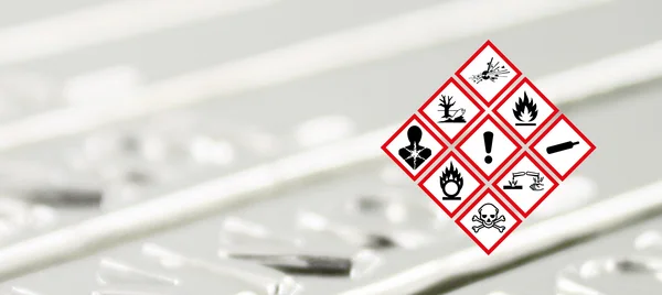 The picture shows several danger signs in the form of a square standing on its tip.